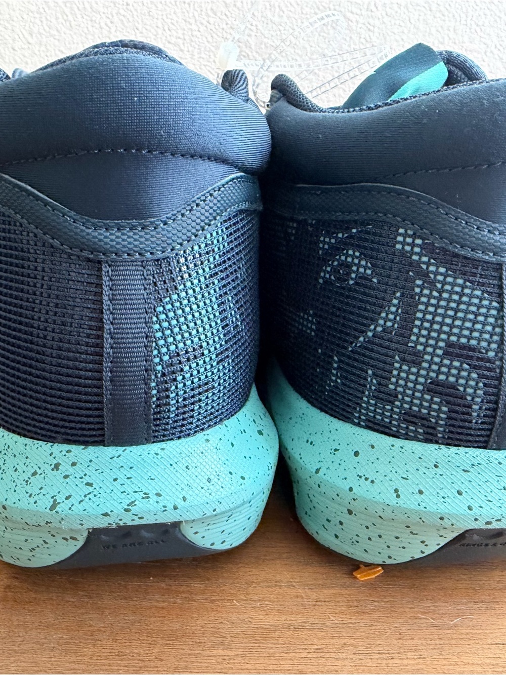 Nike Kids Black and Teal Speckled Sole Sneakers